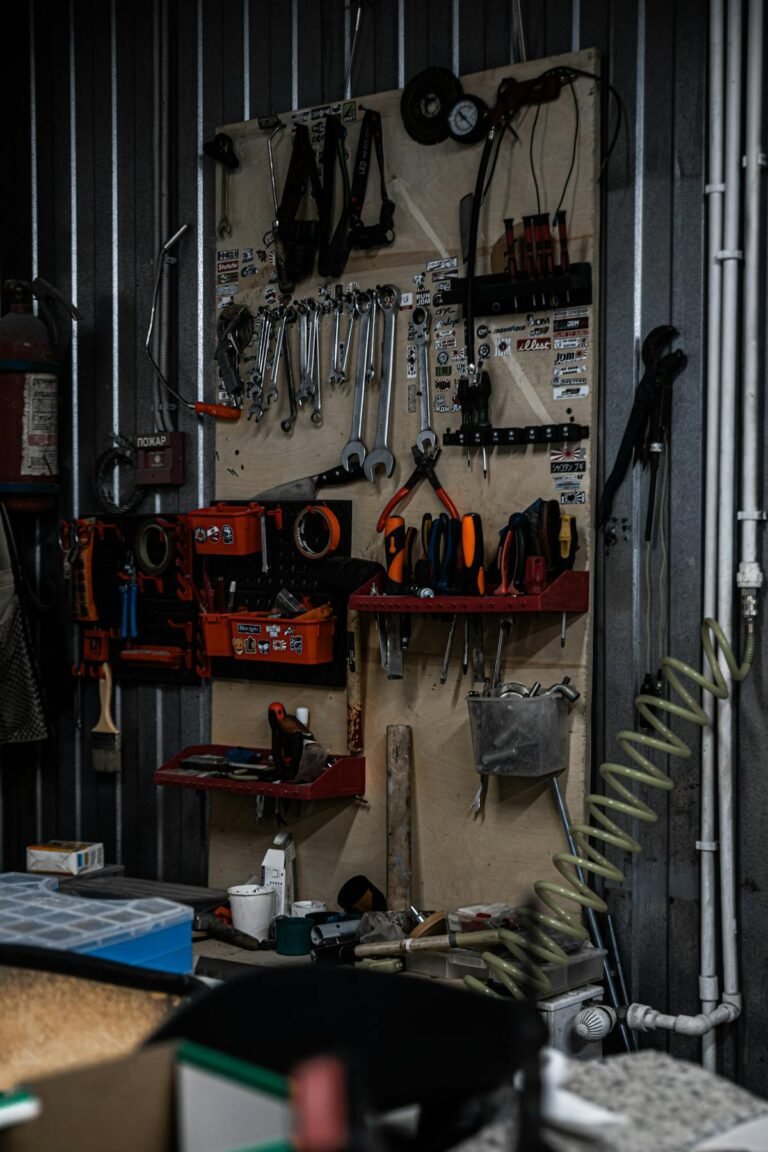 Well organized garage workshop with tools on pegboard